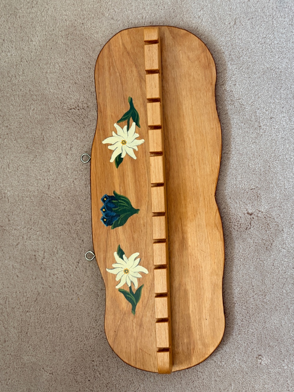 Vintage wooden spoon rack. Holds 12 spoons.